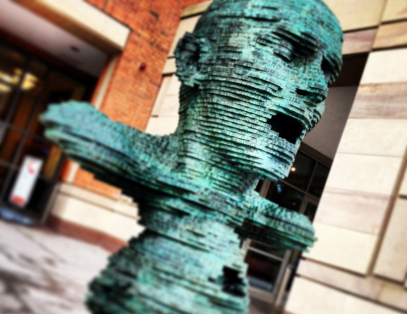 Eco statue outside the McClay Library