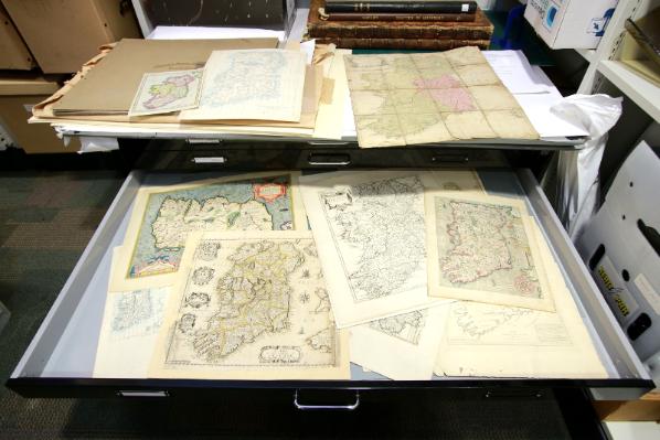 Open drawers of map cabinet in Special Collections displaying Ewart maps.