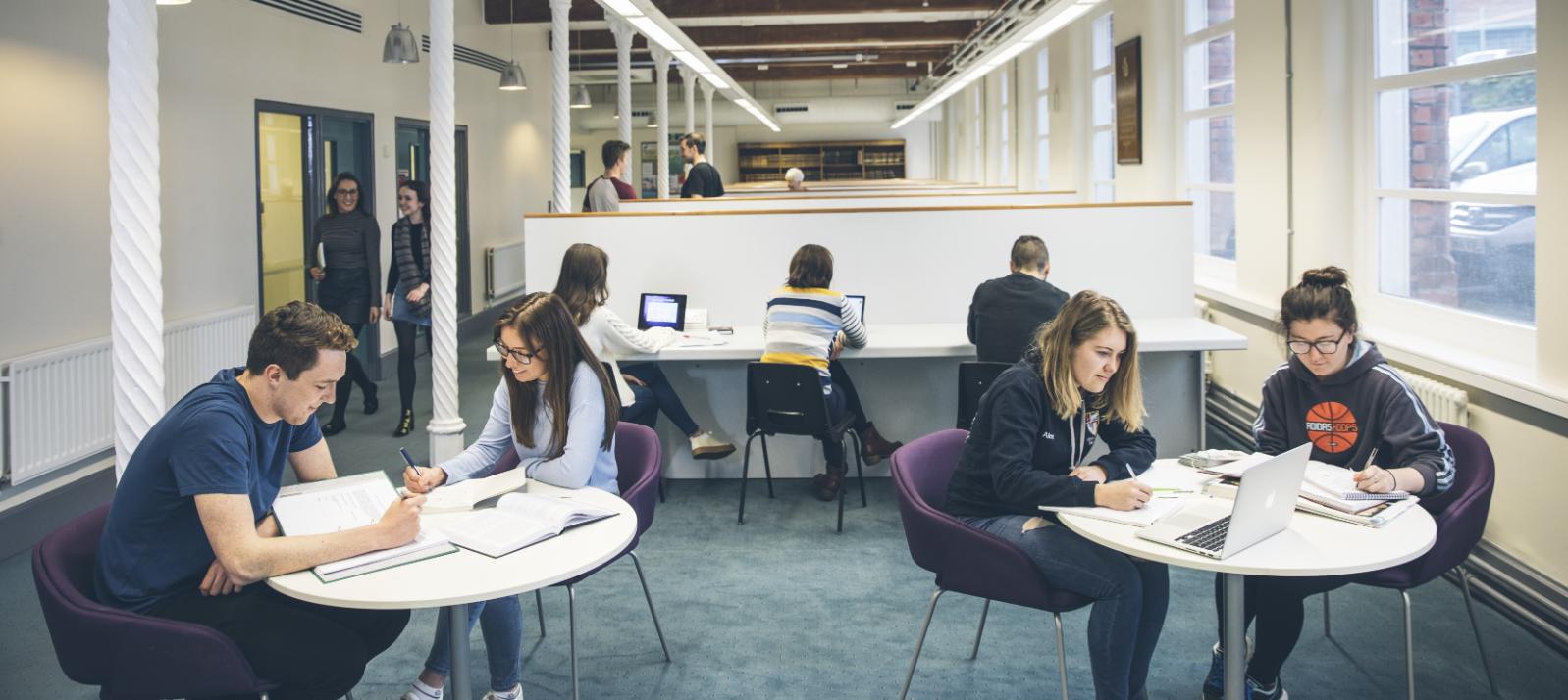 Students sitting in the Fry Room in QUB Medical Library