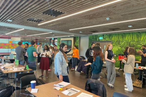 students at an event in the Cube in One Elmwood networking