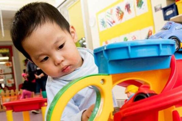 Child playing with toy