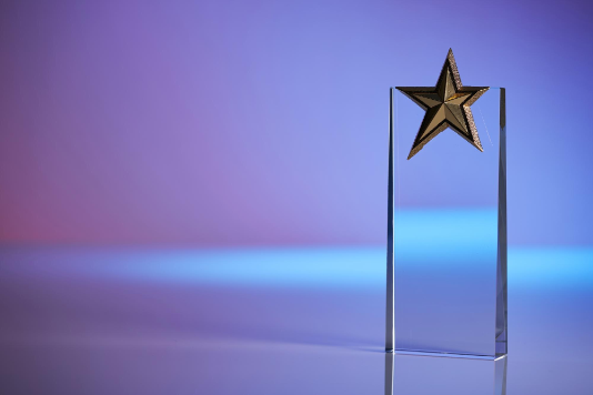 Glass trophy with a star on top