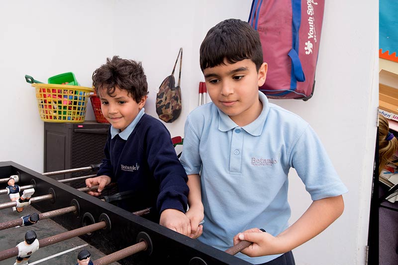 Two children playing in Queen's out of school club