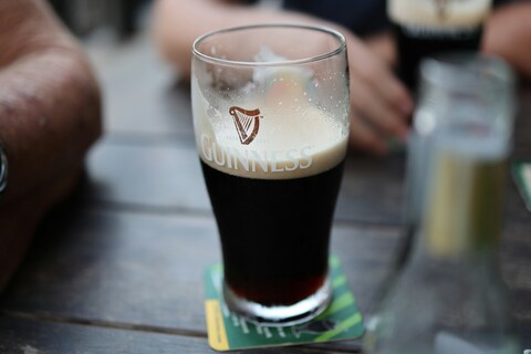 Half drunk pint of Guinness