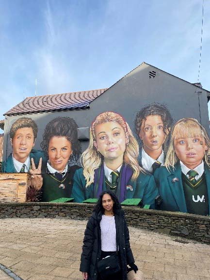 Sumita at derry girls mural