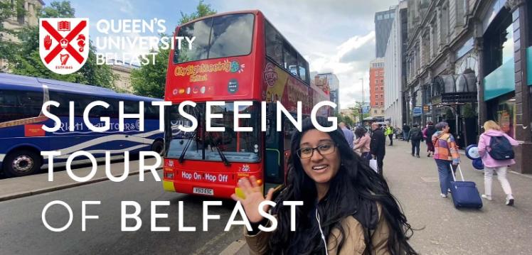 Sightseeing tour of Belfast thumbnail showing woman looking at a map