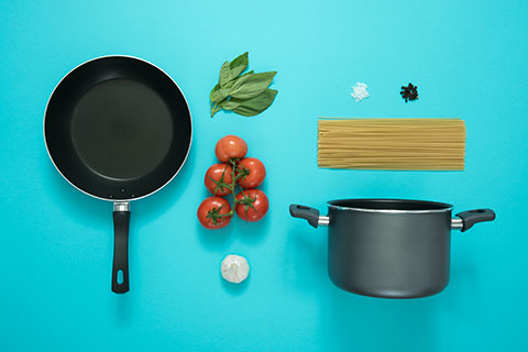 frying pan, sauce pan, tomatoes, basil and pasta