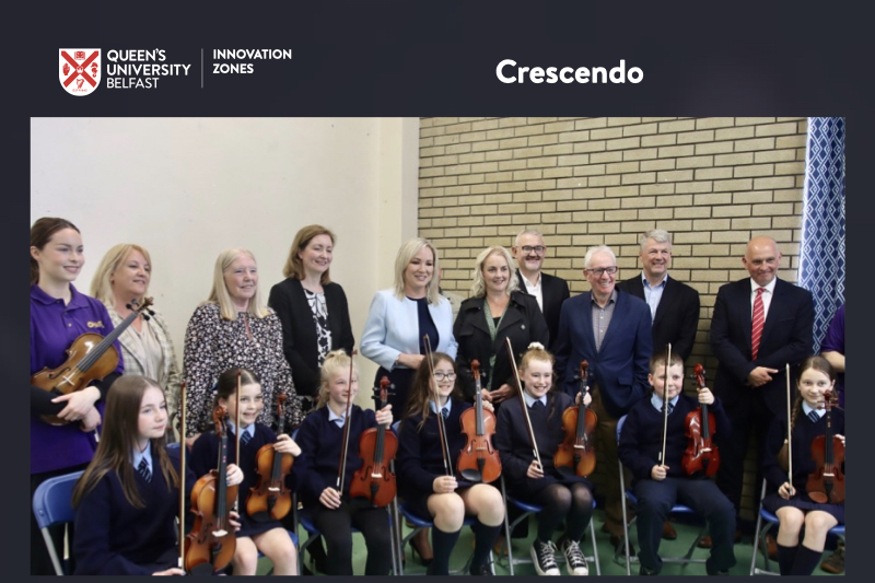 First Minister, Junior Minister, staff and pupils in school hall