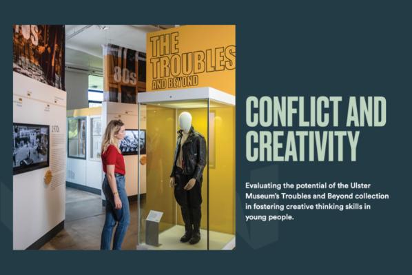 Conflict and Creativity image, with young woman standing in Ulster Museum exhibition on 'The Troubles'.