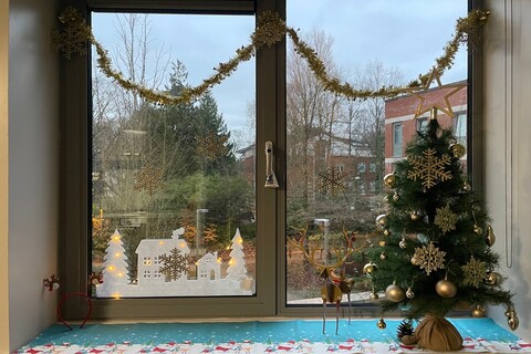 Window decorated with Christmas decorations in student accommodation