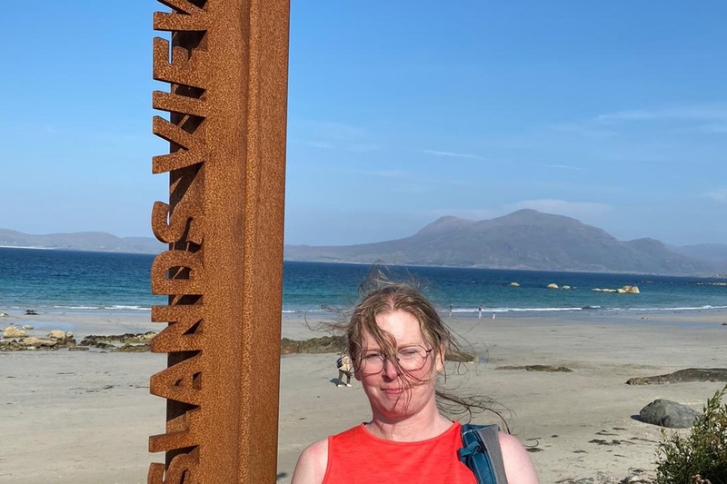 Student Caroline at beach