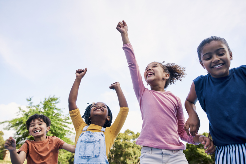 Group of children cheering