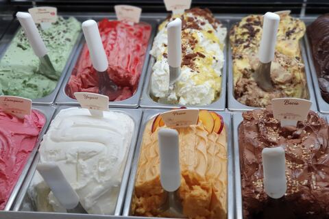 Selection of ice cream flavours in metal containers