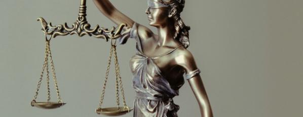 Bronze scales of justice statue