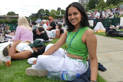 Student Radhika sitting on the grass on Murray's Mount