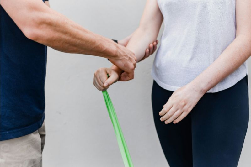 two people using a resistance band