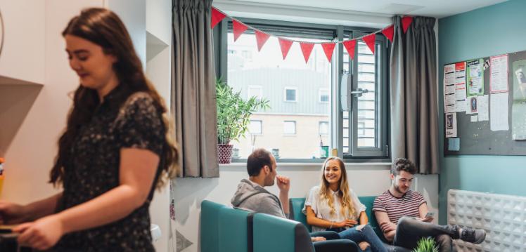 Group of four students in kitchen accommodation