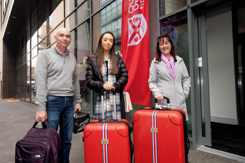 Student with parents outside Elms Accommodation