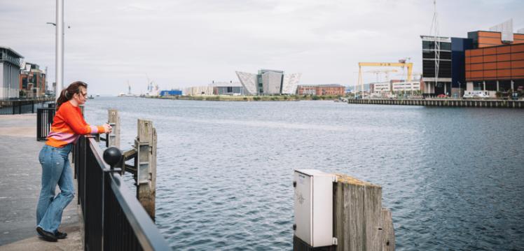 Student overlooking the Titanic Quarter