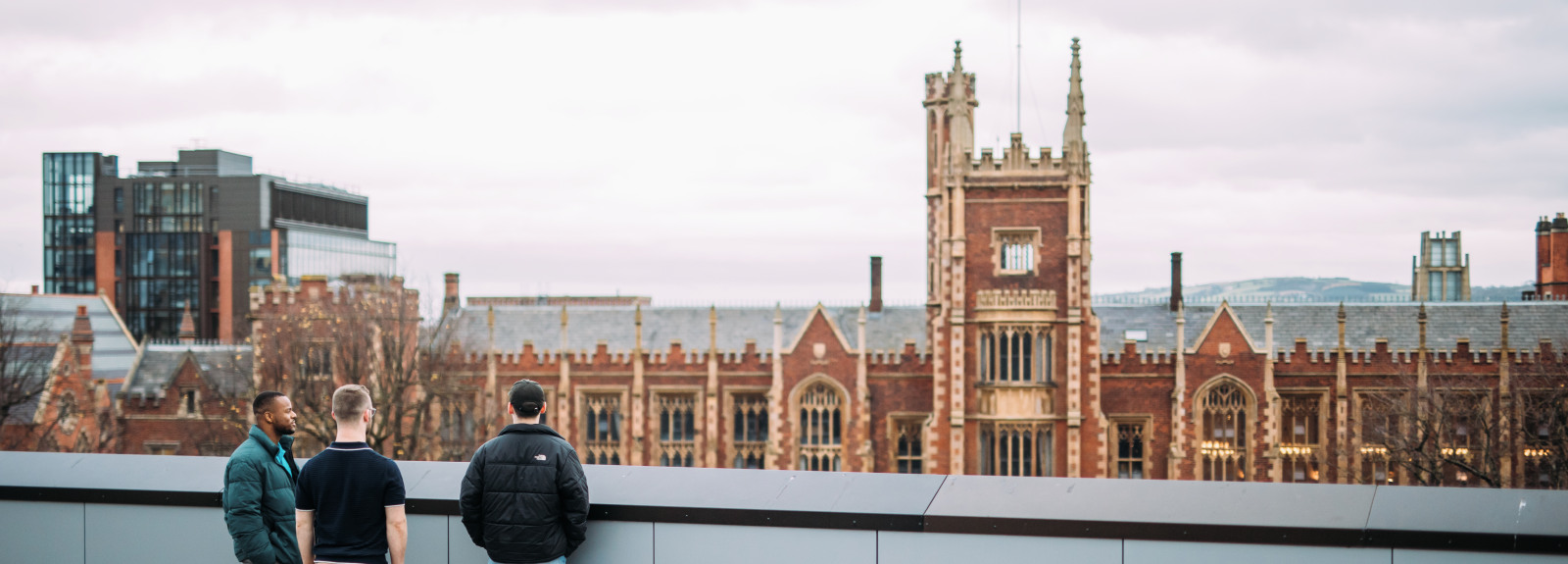 Students standing opposite the Lanyon Building