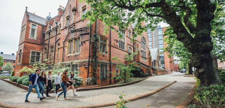 Students walking past the School of Music