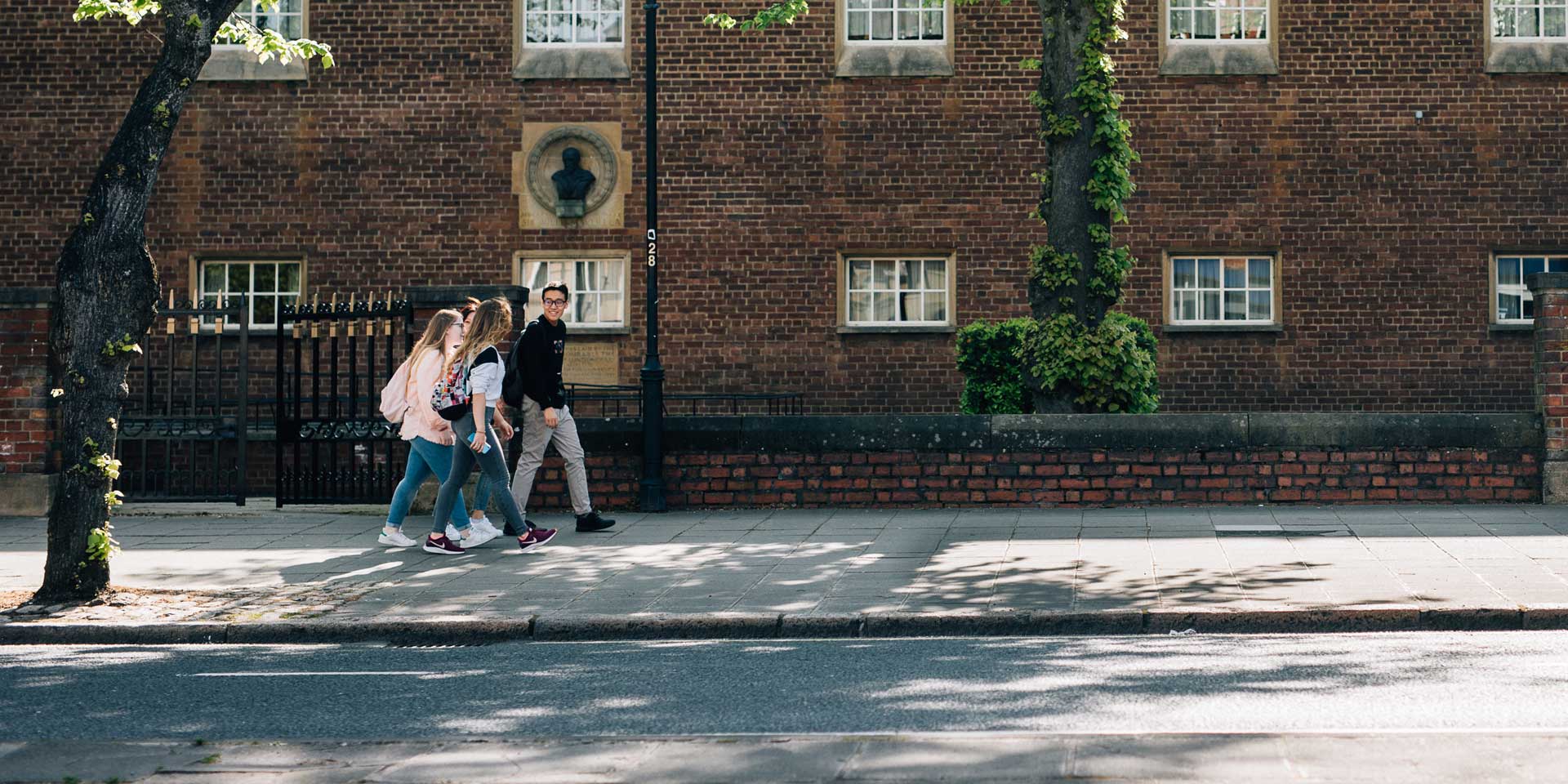 Students walking up street