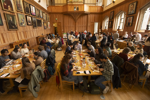 Students at Thanksgiving event in the Great Hall, QUB