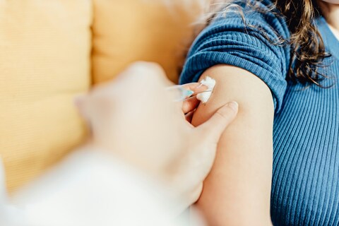 Woman receiving vaccination