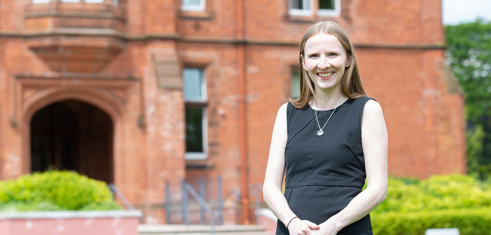 Prof Máire O'Neill outside Riddle Hall