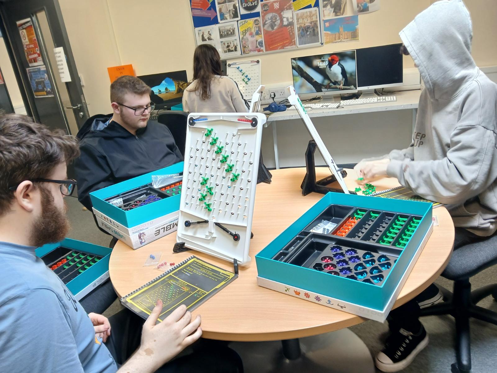 Students playing Turing Tumble Game
