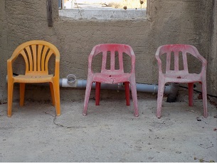 Three Plastic Chairs in Kos