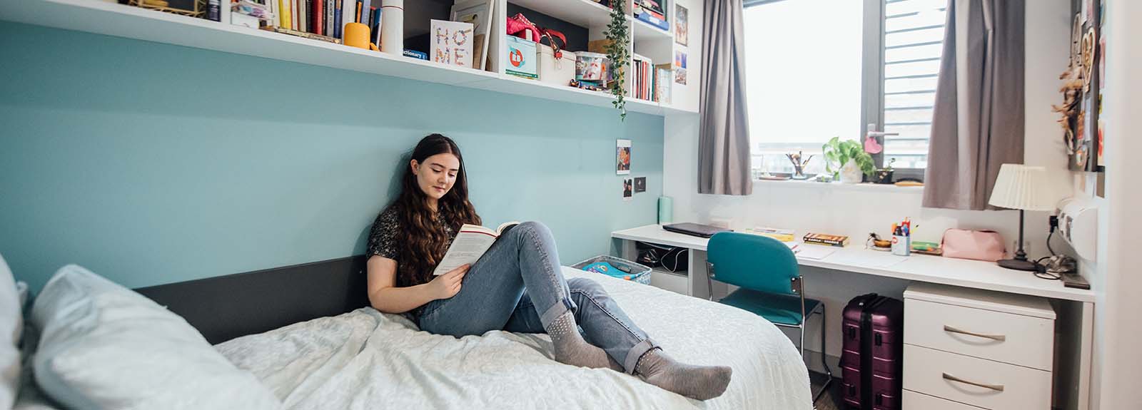 Student in Halls bedroom