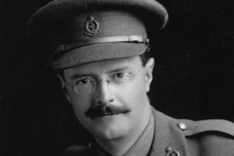 close-up of bespectacled Irish neurologist Gordon Morgan Holmes in army uniform